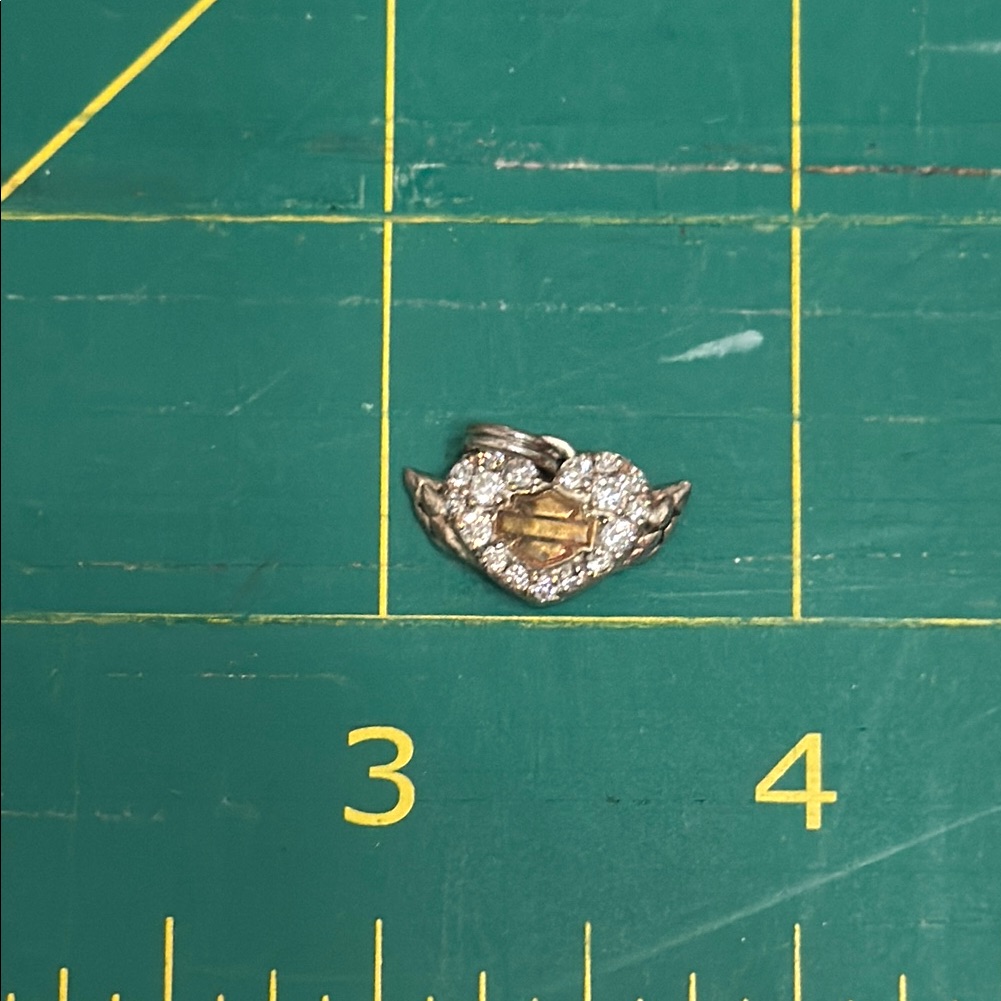 Silver And Gold Heart Pendant 25$
